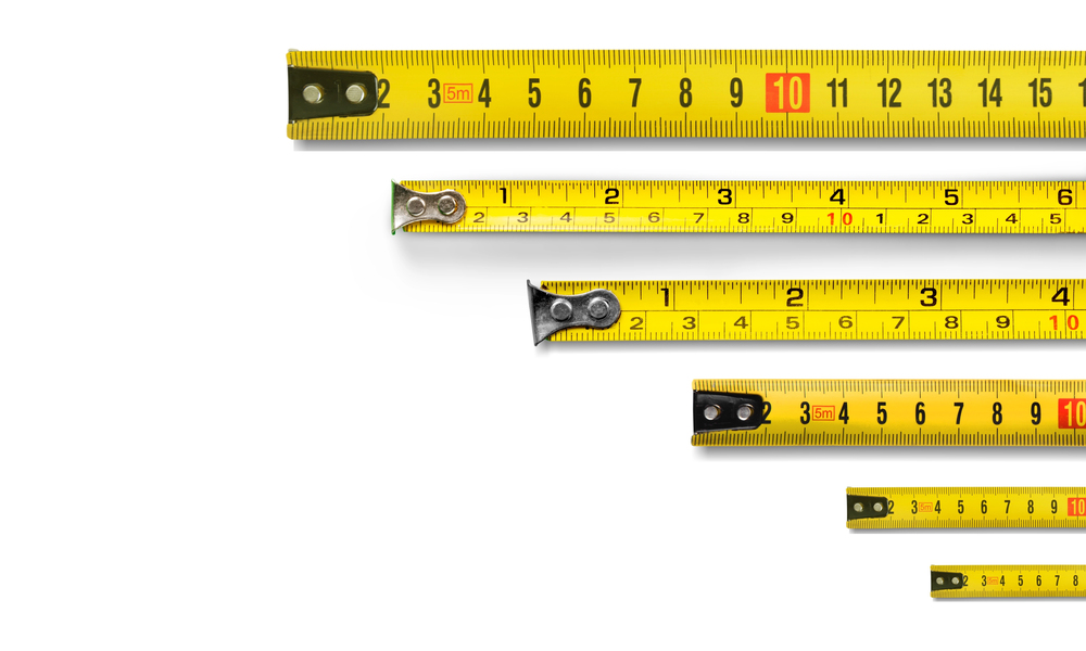 Various yellow tape measures are presented